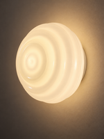 Close view of softly glowing concentric glass rings