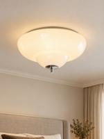 Opal Tier glass flush mount ceiling light with chrome details in a neutral bedroom