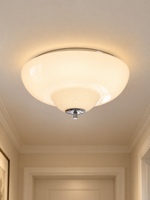 Opal Tier ceiling light glowing warmly in a cream hallway