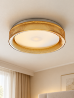 Halo Rim ceiling light in cognac ribbed glass with a silver ceiling plate