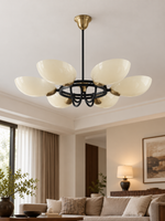 Six-light Opal Petal Ring Chandelier, 90 cm diameter, unlit in a living room