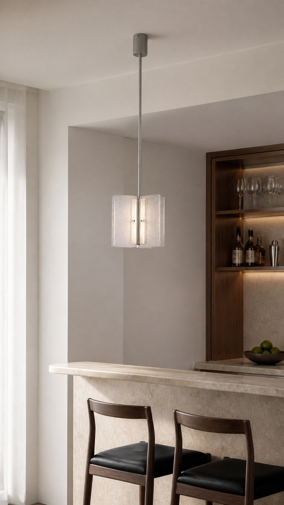 Prismelle Pendant above a bar counter